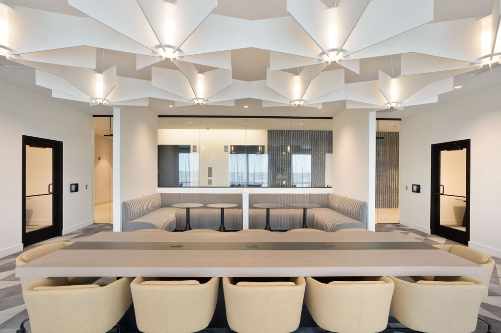 a conference room with a large table and chairs at Platform 4611, Chicago, IL