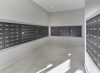 a room with a bunch of mailboxes