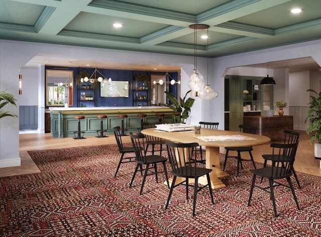 a dining room with a table and chairs