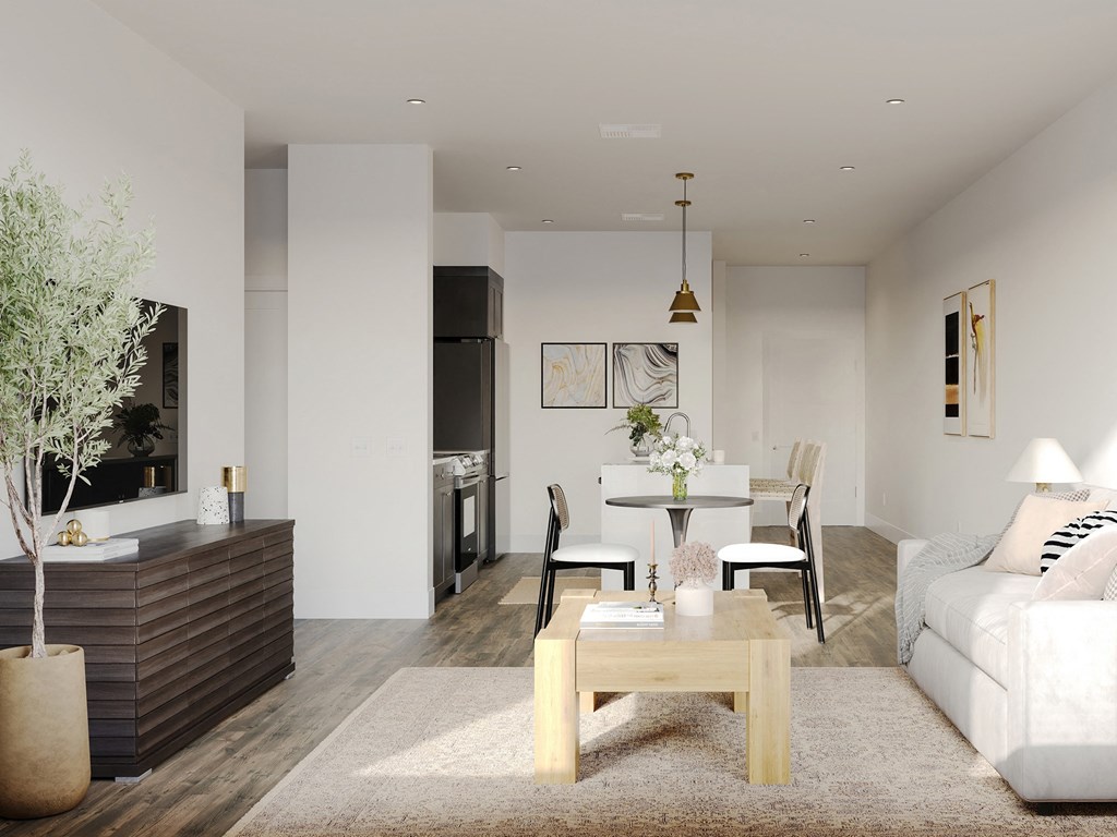 a living room and dining room with a couch and a table