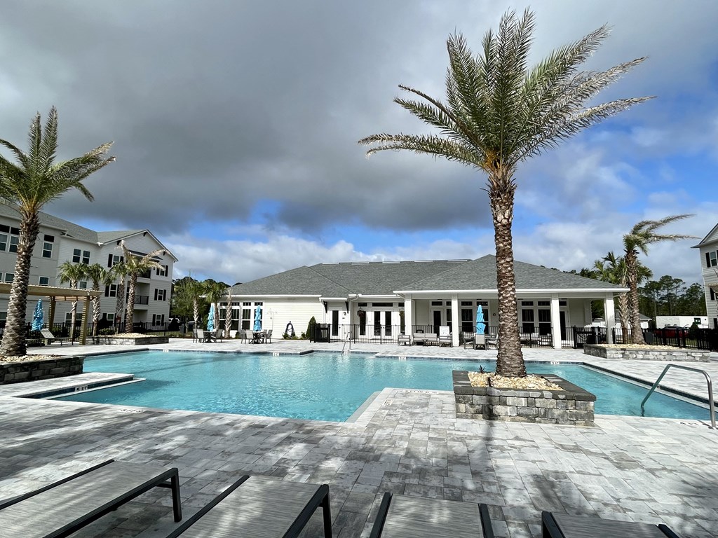 view of the pool and clubhouse and leasing office