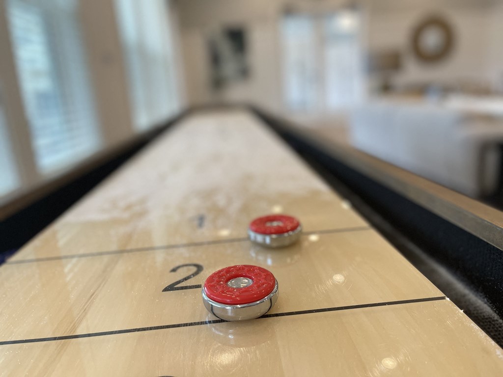 a close up of a shuffleboard table with the number 20 on it