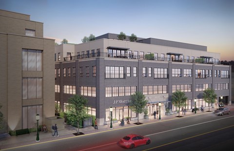 A rendering of a modern building with the name "JIM MORGAN" on the front.
