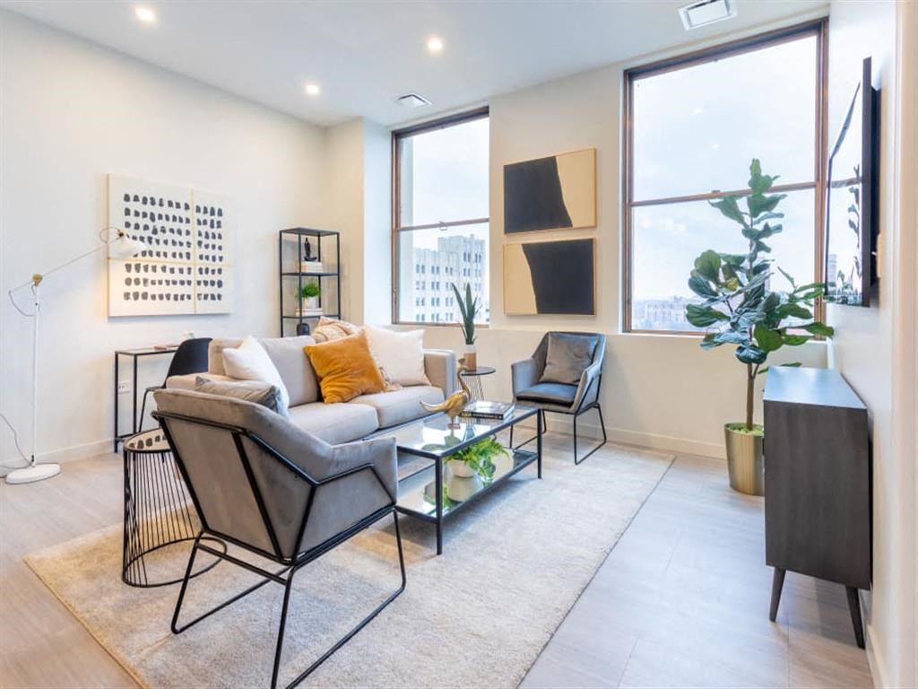 a living room with a couch and a table