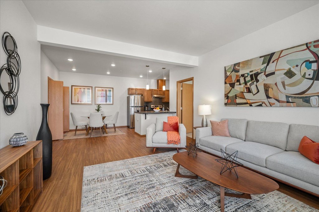 a living room with a couch and a table