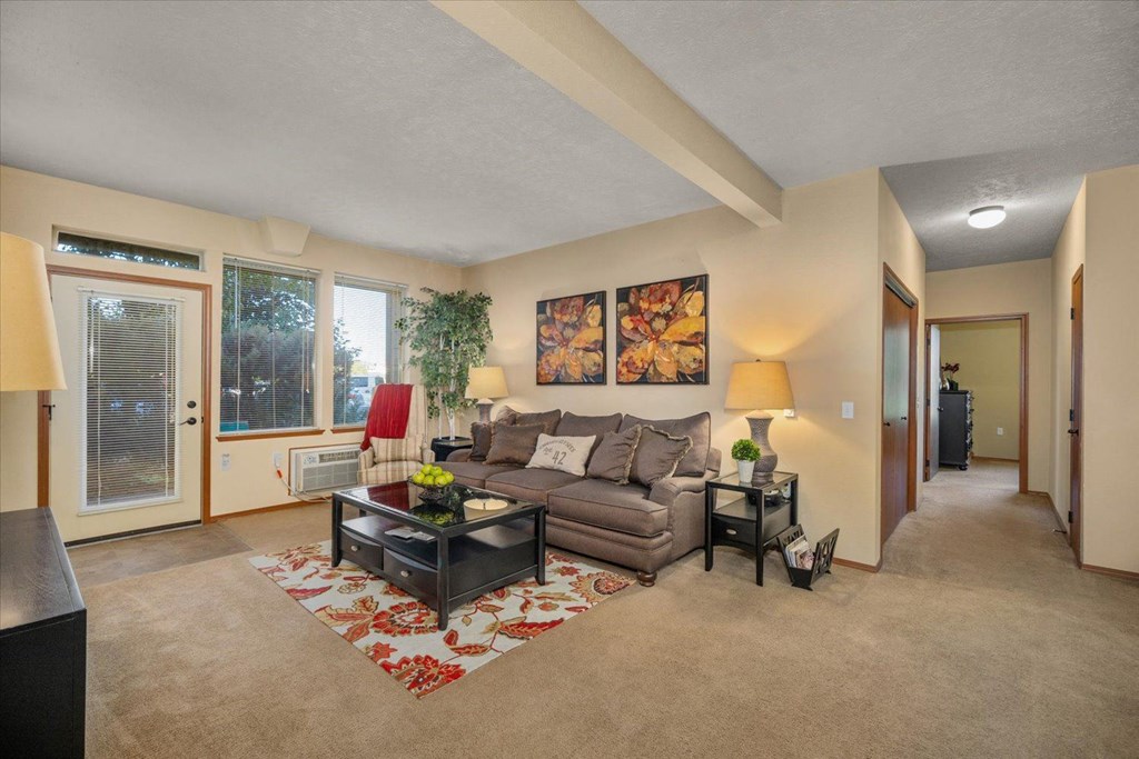 a living room with a couch and a table