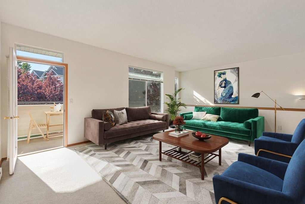 a living room with two couches and a coffee table