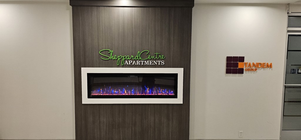 a fireplace with a sign on the side of it
