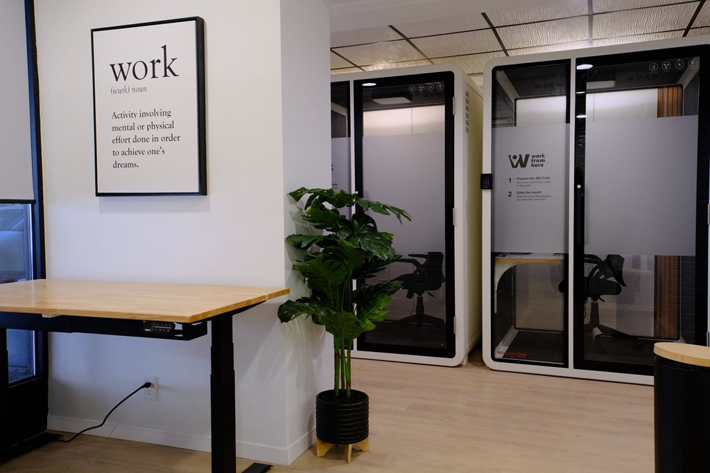 a table and a potted plant in a room