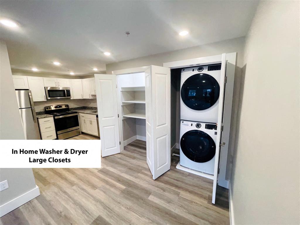 a small laundry room with a washer and dryer in a closet