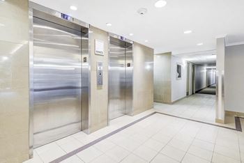 Two elevators in a lobby  at Platts Crossing, London, ON, N6H 4P4