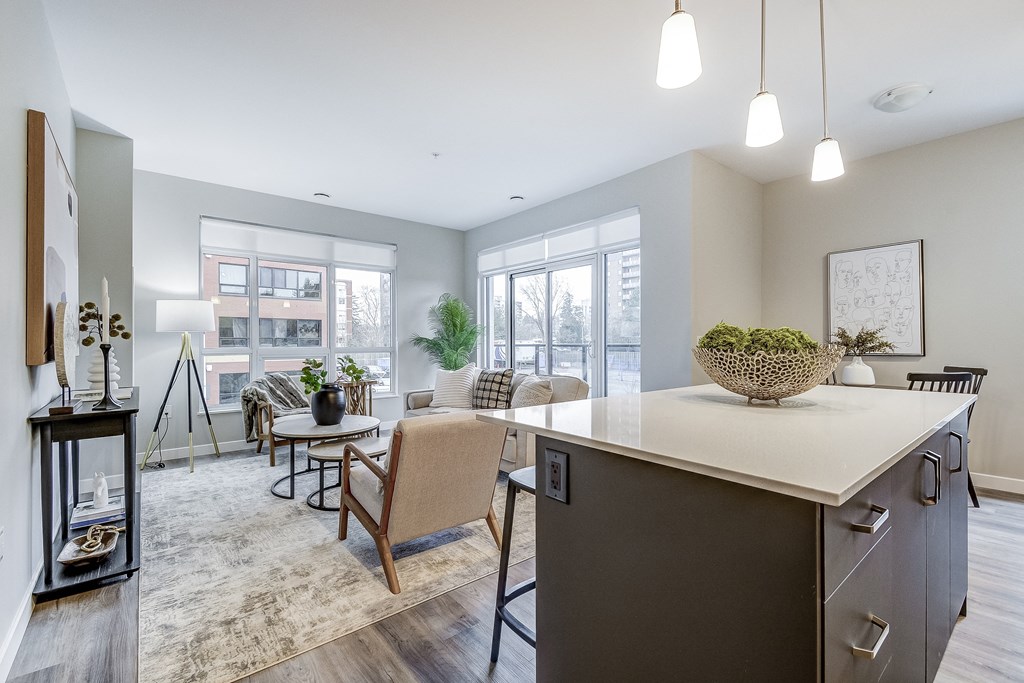 Open living room with a kitchen and a dining room at 101 Base Line Road West, London, Ontario