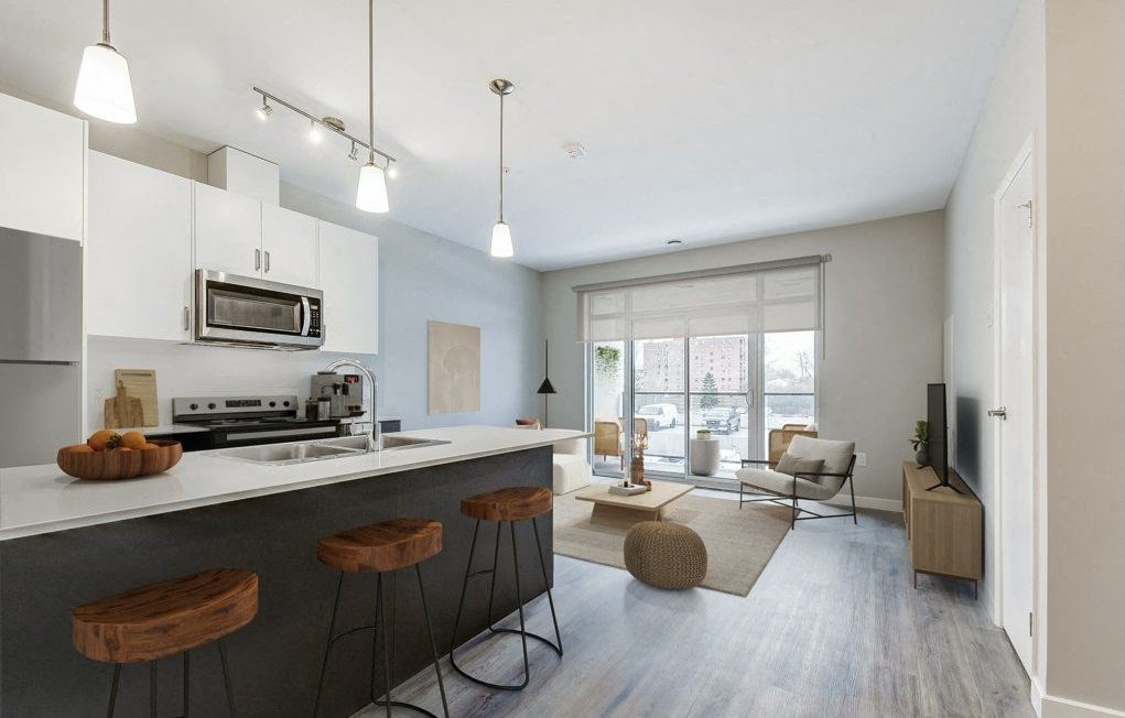 Kitchen and living room with an open floor plan  at 101 Base Line Road West, Ontario