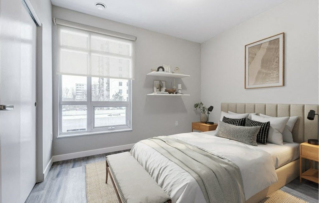 Bedroom with a bed and a window  at 101 Base Line Road West, London, Ontario