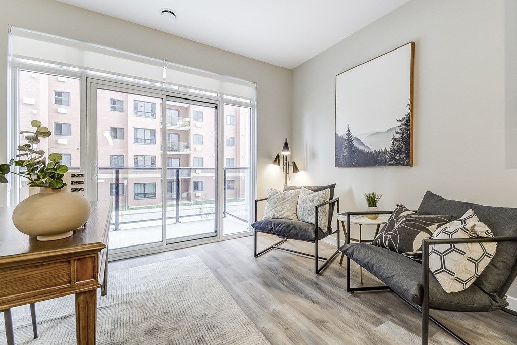 Living room with a large window and a balcony  at 101 Base Line Road West, London