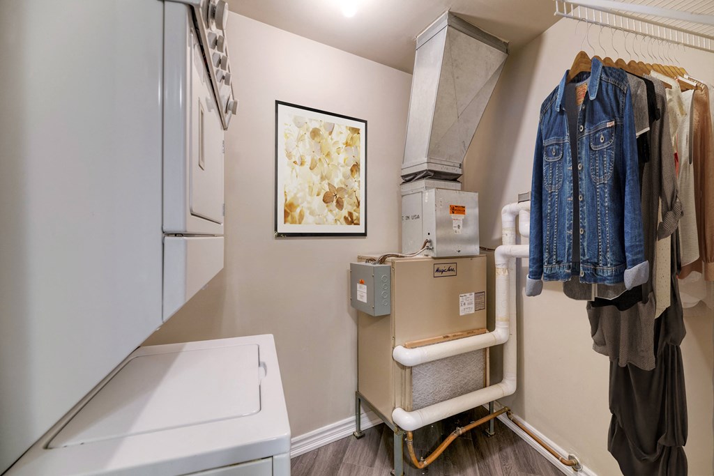 a laundry room with a washer and dryer