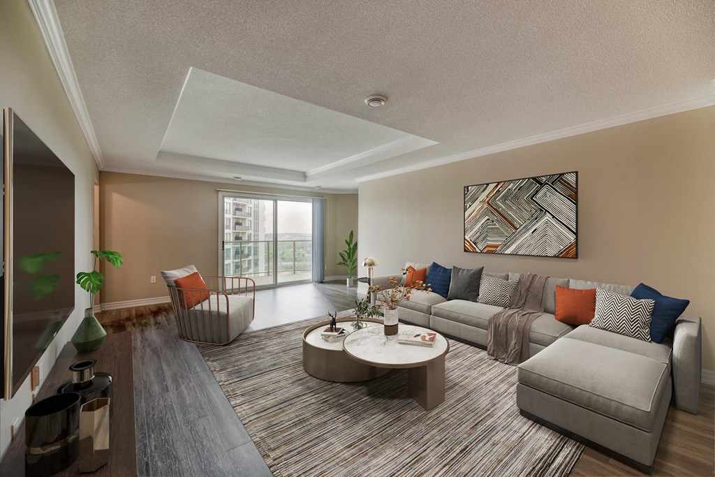 a living room with a large couch and a coffee table