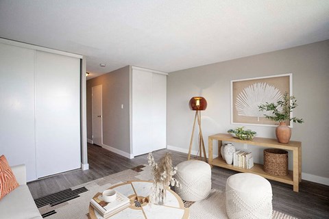 a living room with a couch and a table