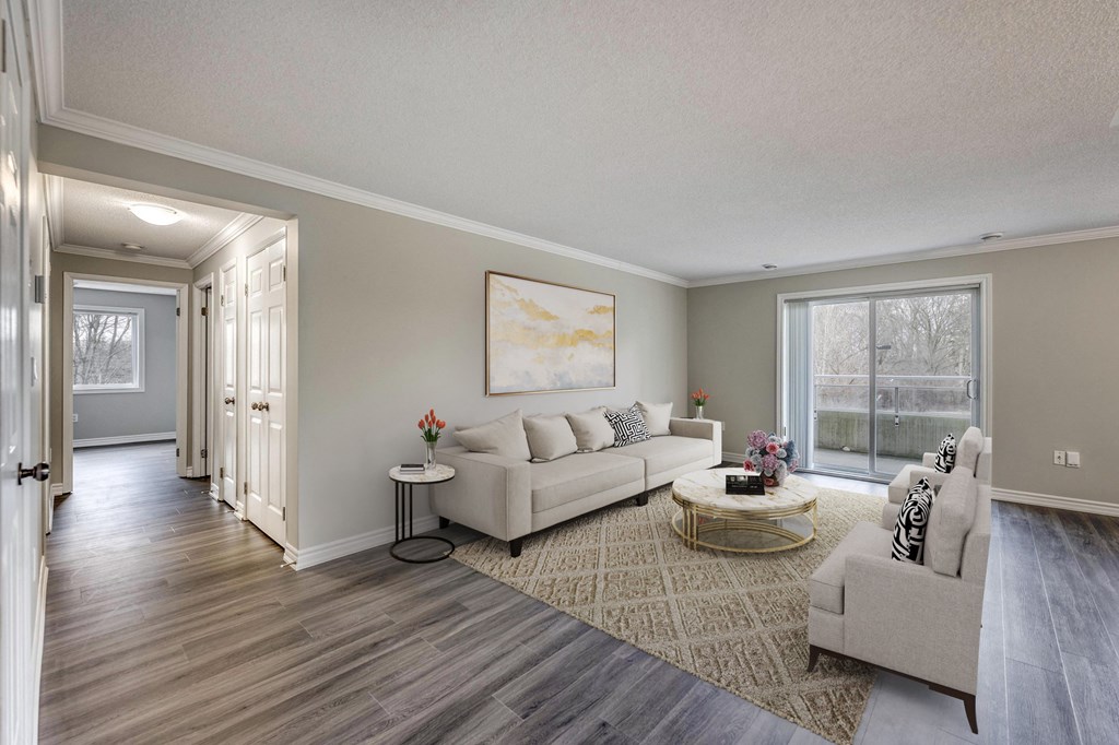 a living room with a couch and a chair