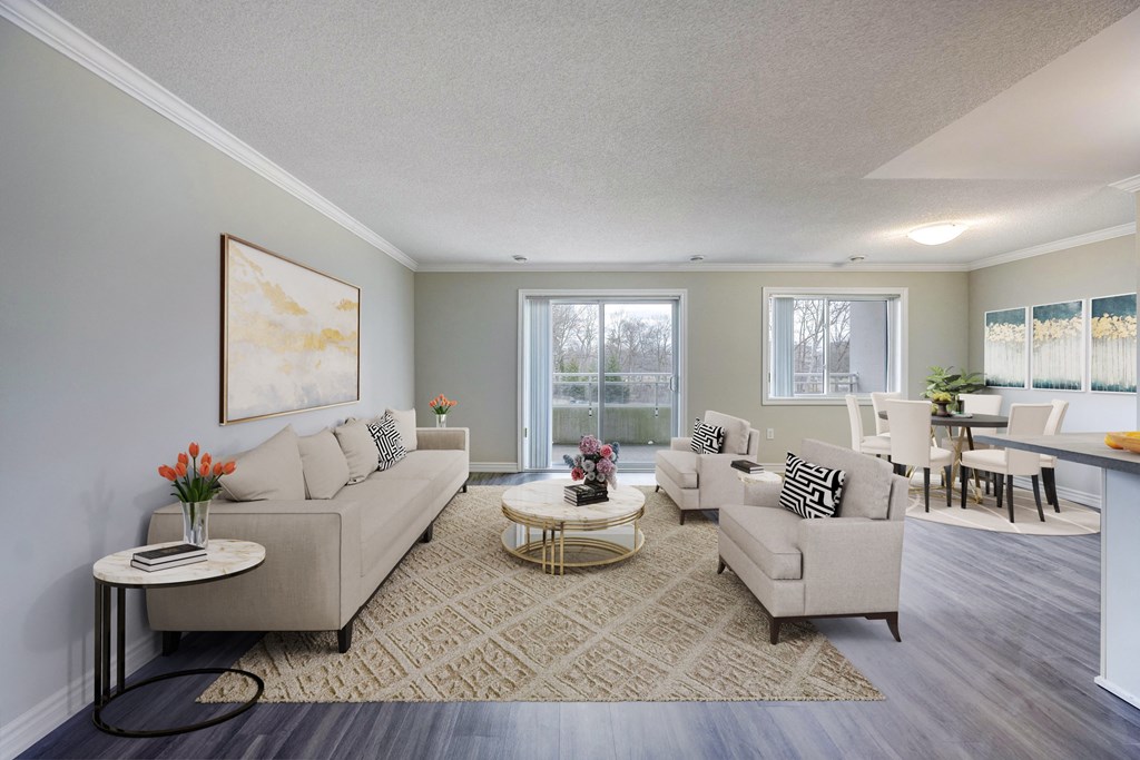 a living room with couches and chairs