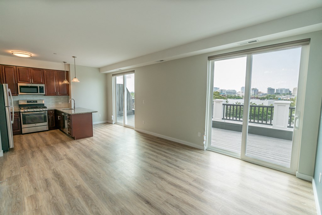 a kitchen and living room in a 555 waverly unit