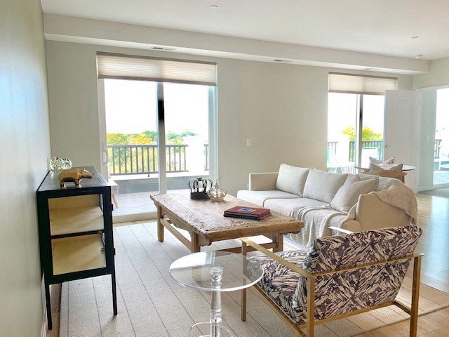 a living room with a couch and a table