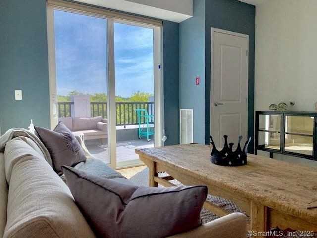a living room with a couch and a table