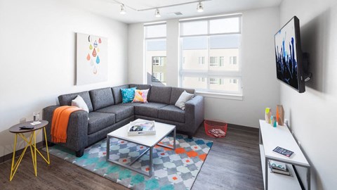 a living room with a couch and a coffee table