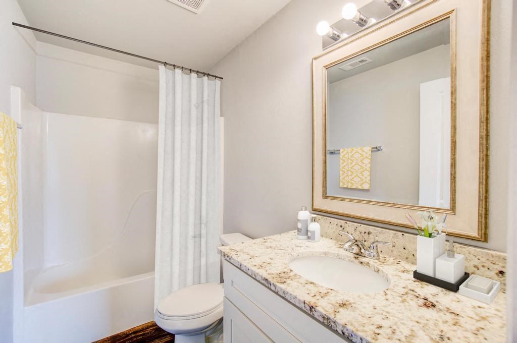 a bathroom with a sink and a toilet