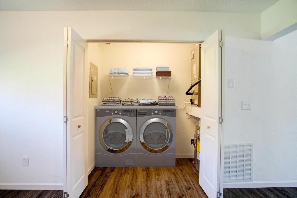 a laundry room with a washer and a dryer