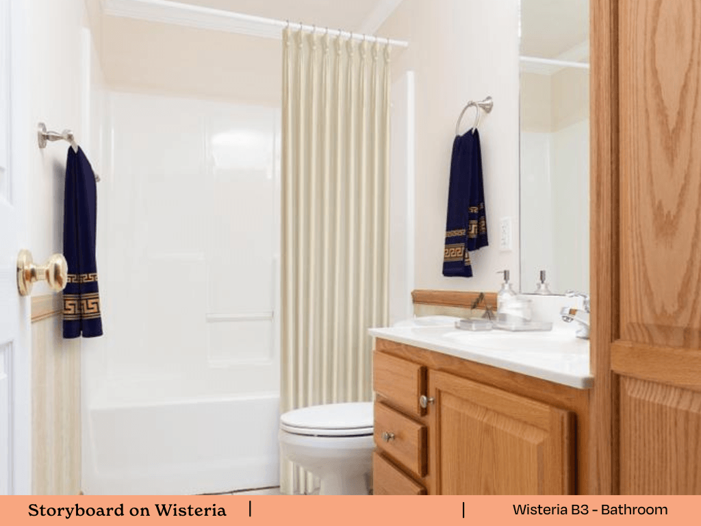 a bathroom with a toilet and a sink and a shower