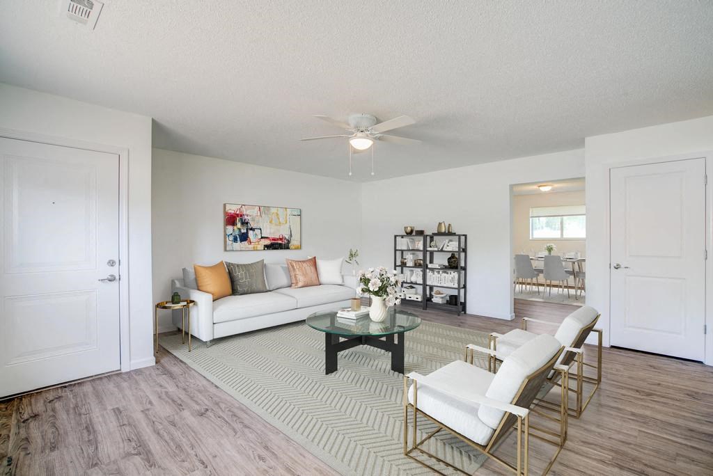 a living room with a couch and a table