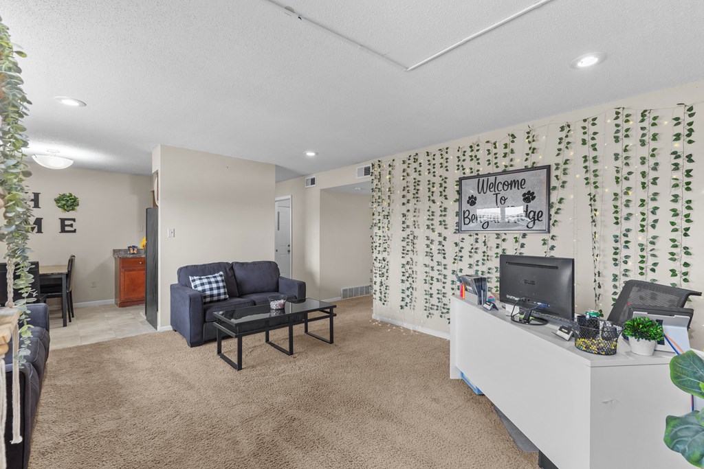 a living room with a couch and a tv