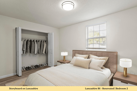 A bedroom with a large bed, a wooden nightstand with a lamp, and a closet with clothes hanging.