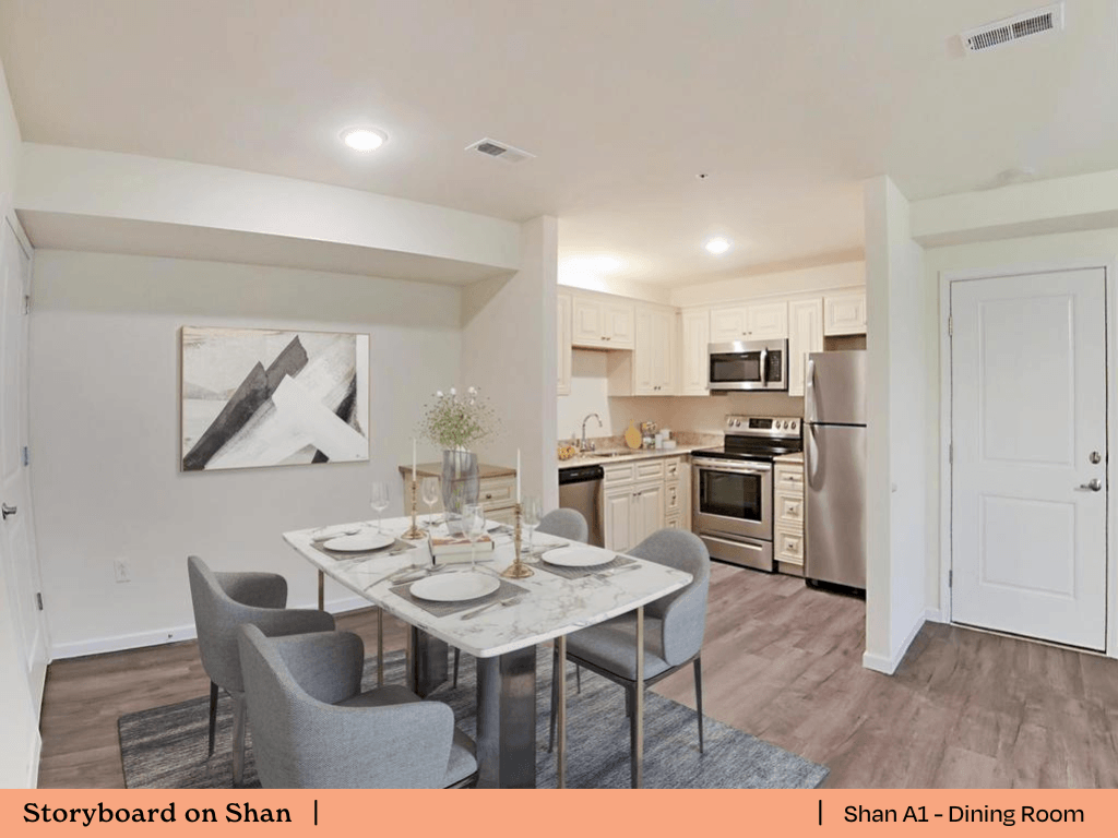 an open kitchen and dining room with a table and chairs