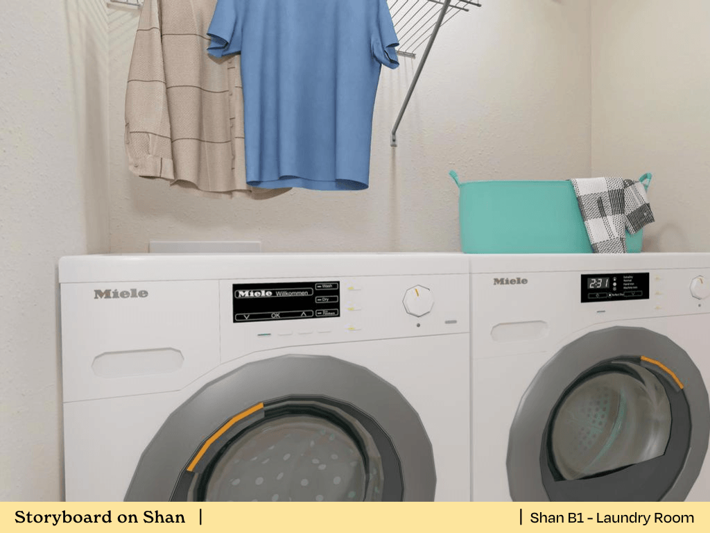 a white washer and dryer in a laundry room with a blue shirt hanging