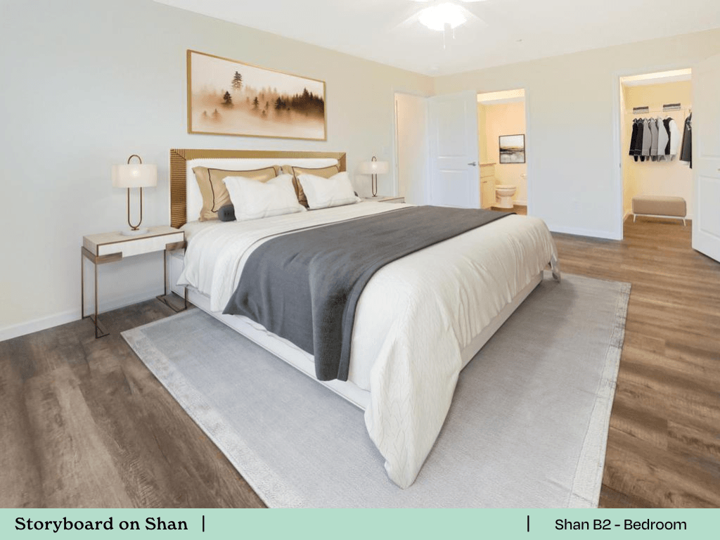 a bedroom with a bed and a rug