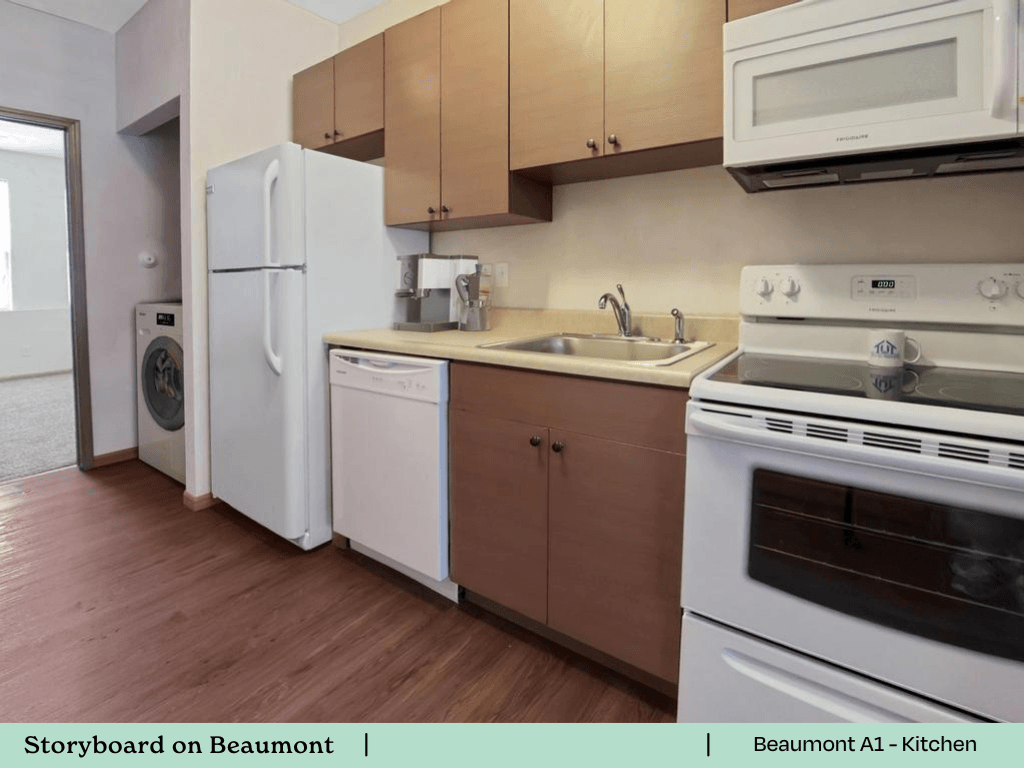 a kitchen with white appliances and wooden floors