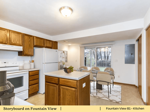 a kitchen with an island and a table with chairs