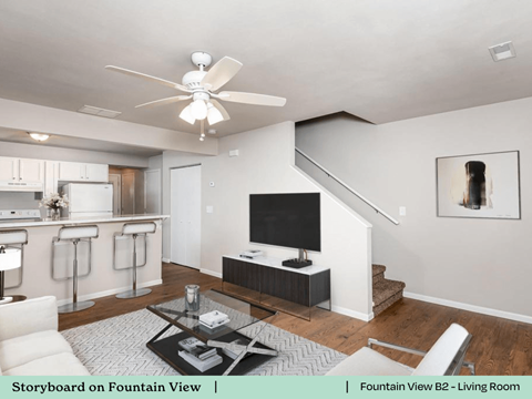 a living room with a couch and a tv