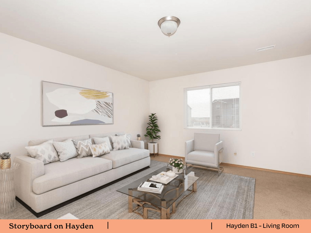 a living room with a couch and a table