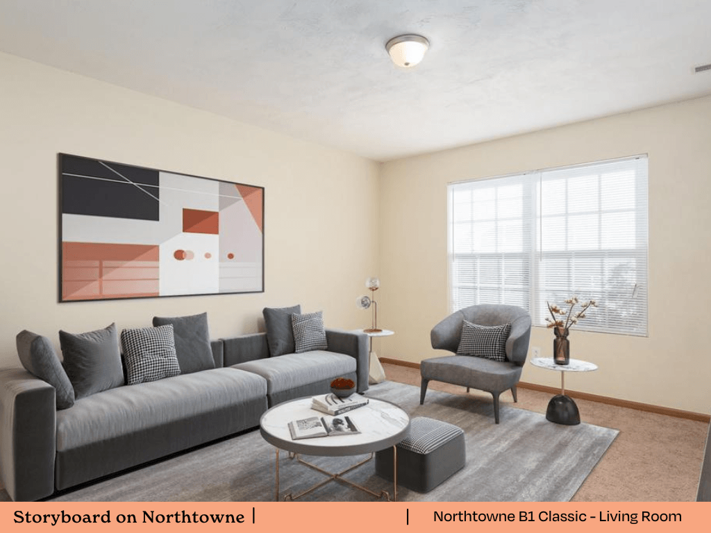 a living room with a couch and a table