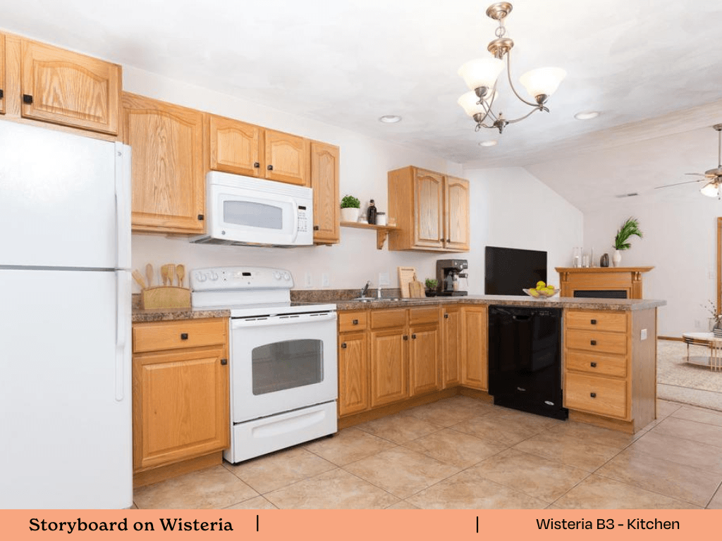 a kitchen with white appliances and wooden cabinets