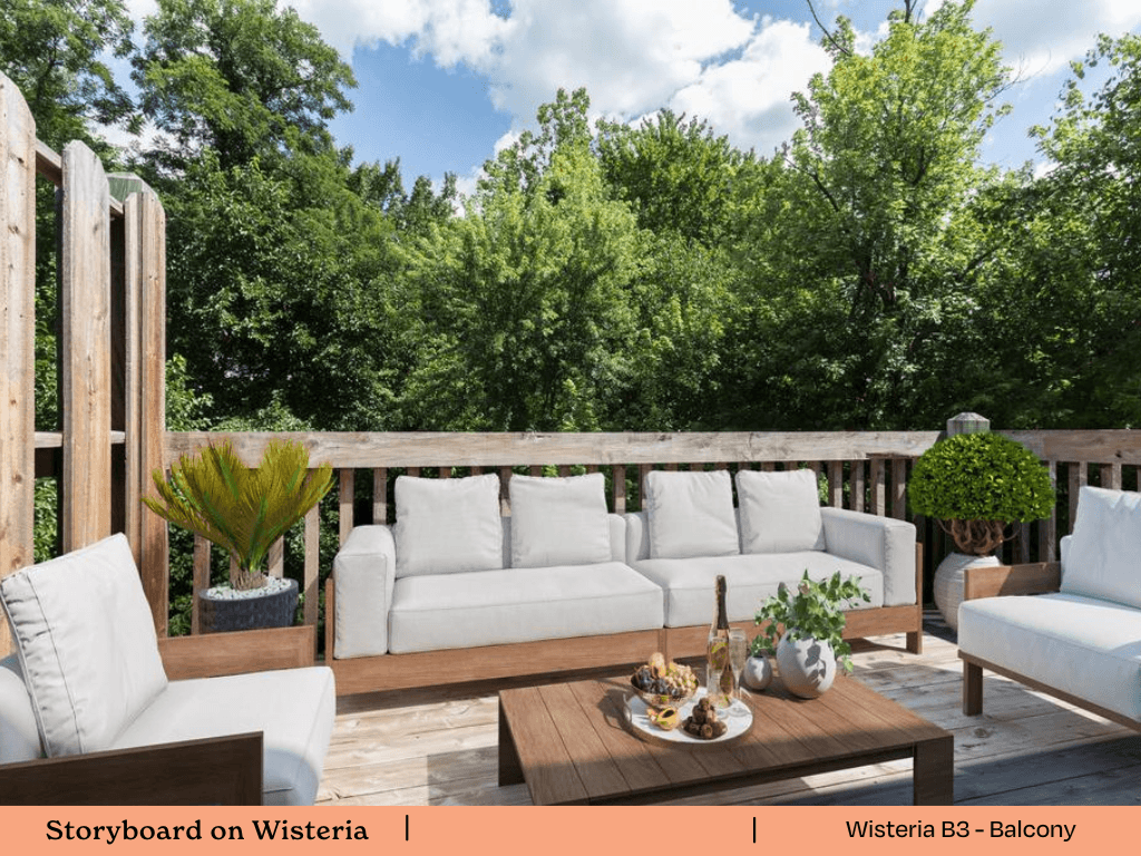 a patio with white furniture on a wooden deck