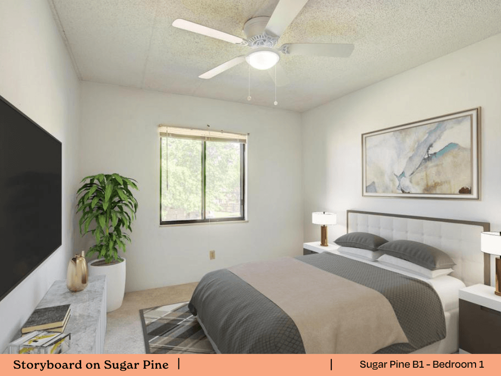 a bedroom with a bed and a ceiling fan
