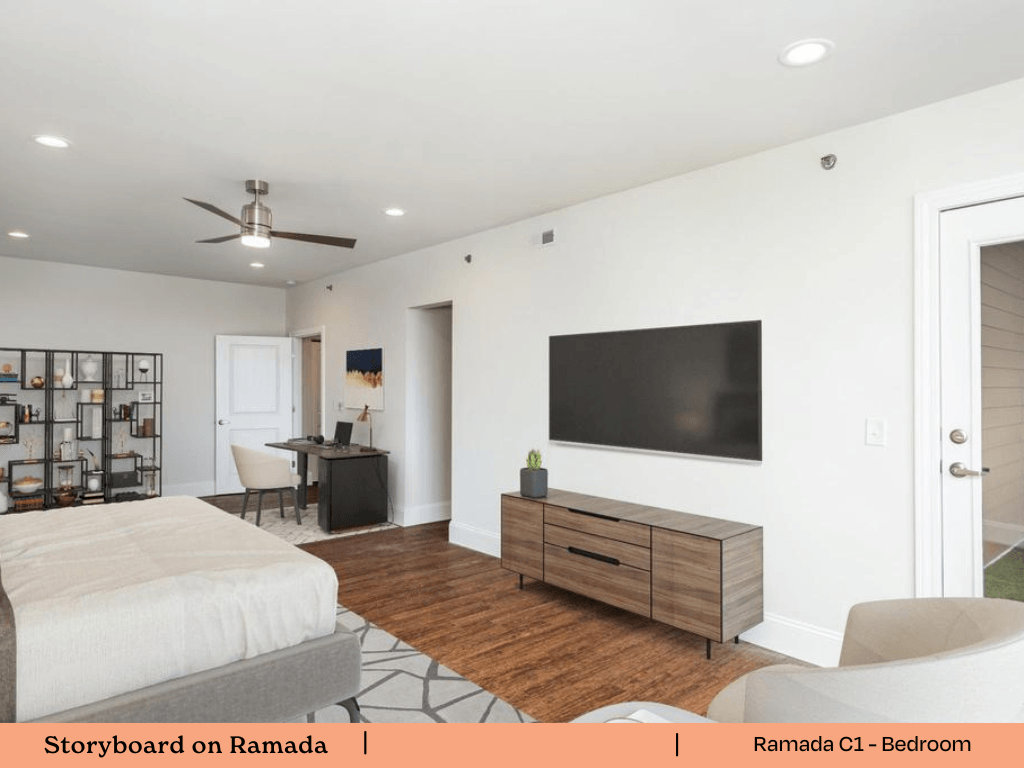 a bedroom with a bed and a tv