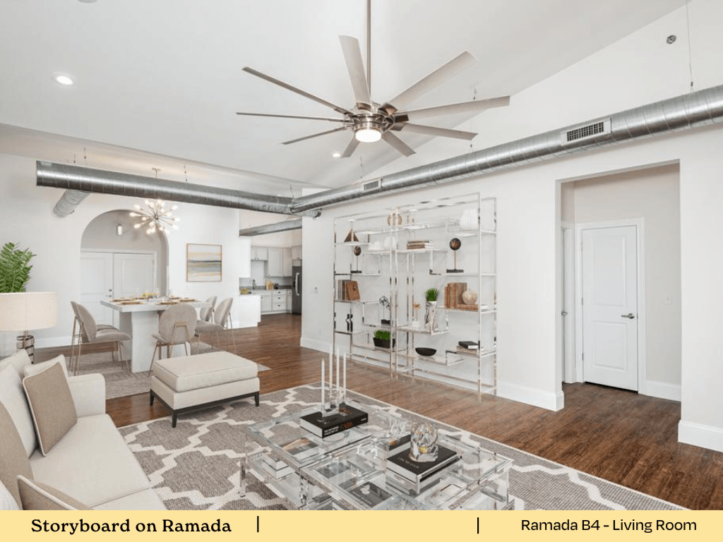 an open living room with a ceiling fan