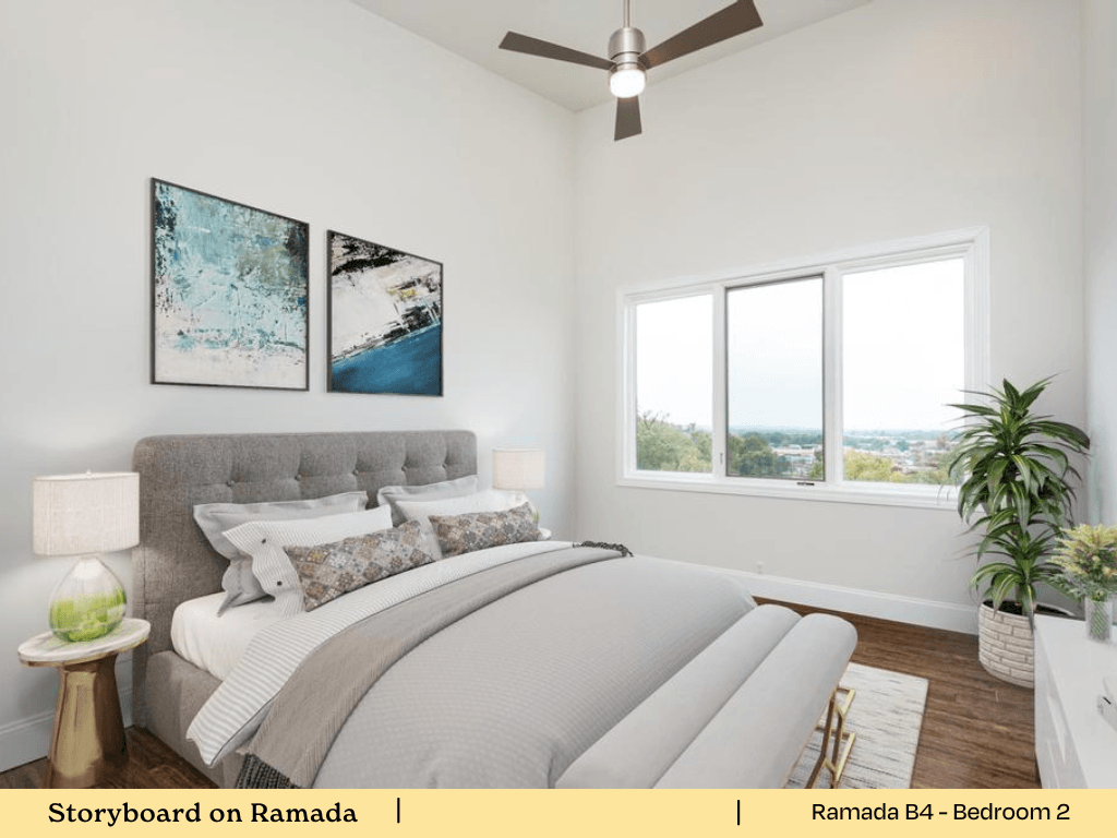 an image of a bedroom with a bed and a ceiling fan