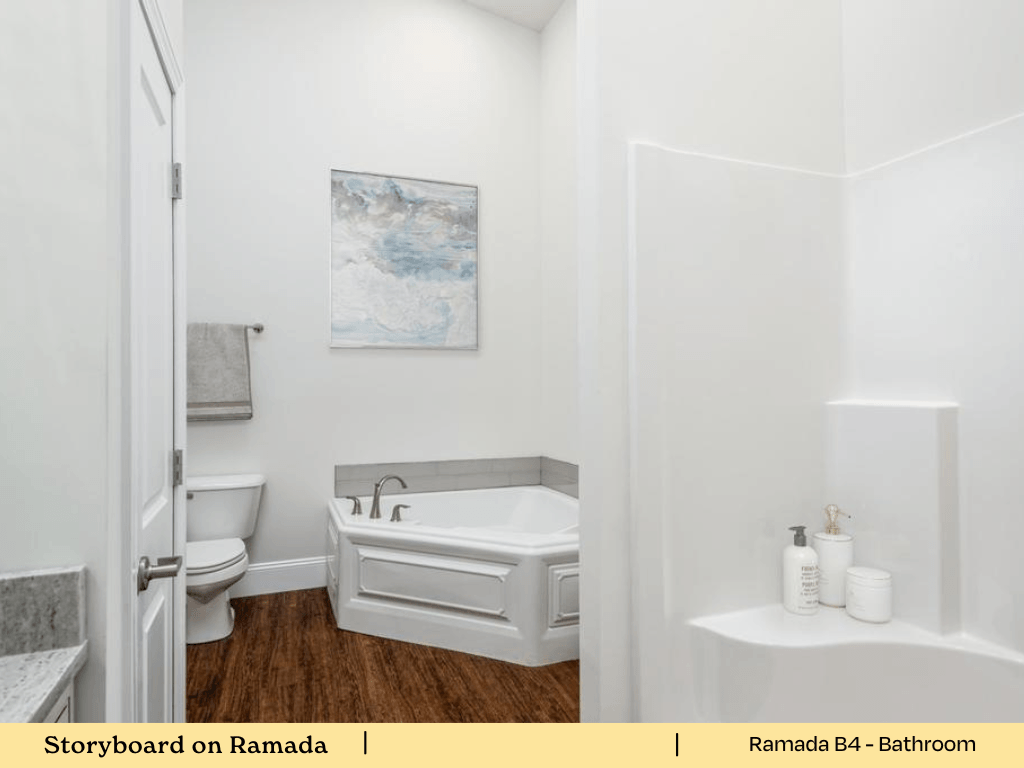 a bathroom with a tub and a toilet and a sink