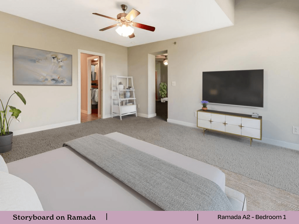 a bedroom with a bed and a ceiling fan and a tv